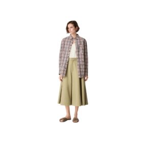 Flache Mules mit gefaltetem Tannenzapfen