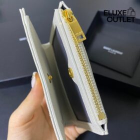 Cassandre matelassierte Zwei-Falten-Brieftasche aus Grain de Poudre Leder 10.5cm