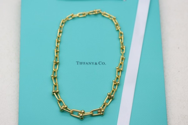 Gliederkette mit abgestuftem Muster in Gelbgold