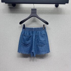 Monogram Blau Denim Mini Shorts