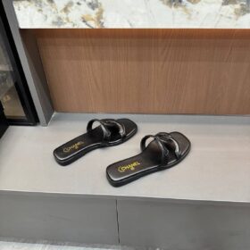 Schwarze Mules aus Lammleder